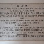 S. Giovanni, Ambulacro interno fra Chiesa Antica e Nuova. Epigrafe Can. G.B. Mariano, Costruttore della Chiesa