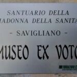 Santuario Sanità, Chiostro, lato Porticato Nord. Targa Museo Ex-voto